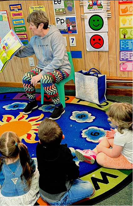 Teacher reading to students